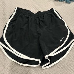 Black and white NIKE athletic shorts